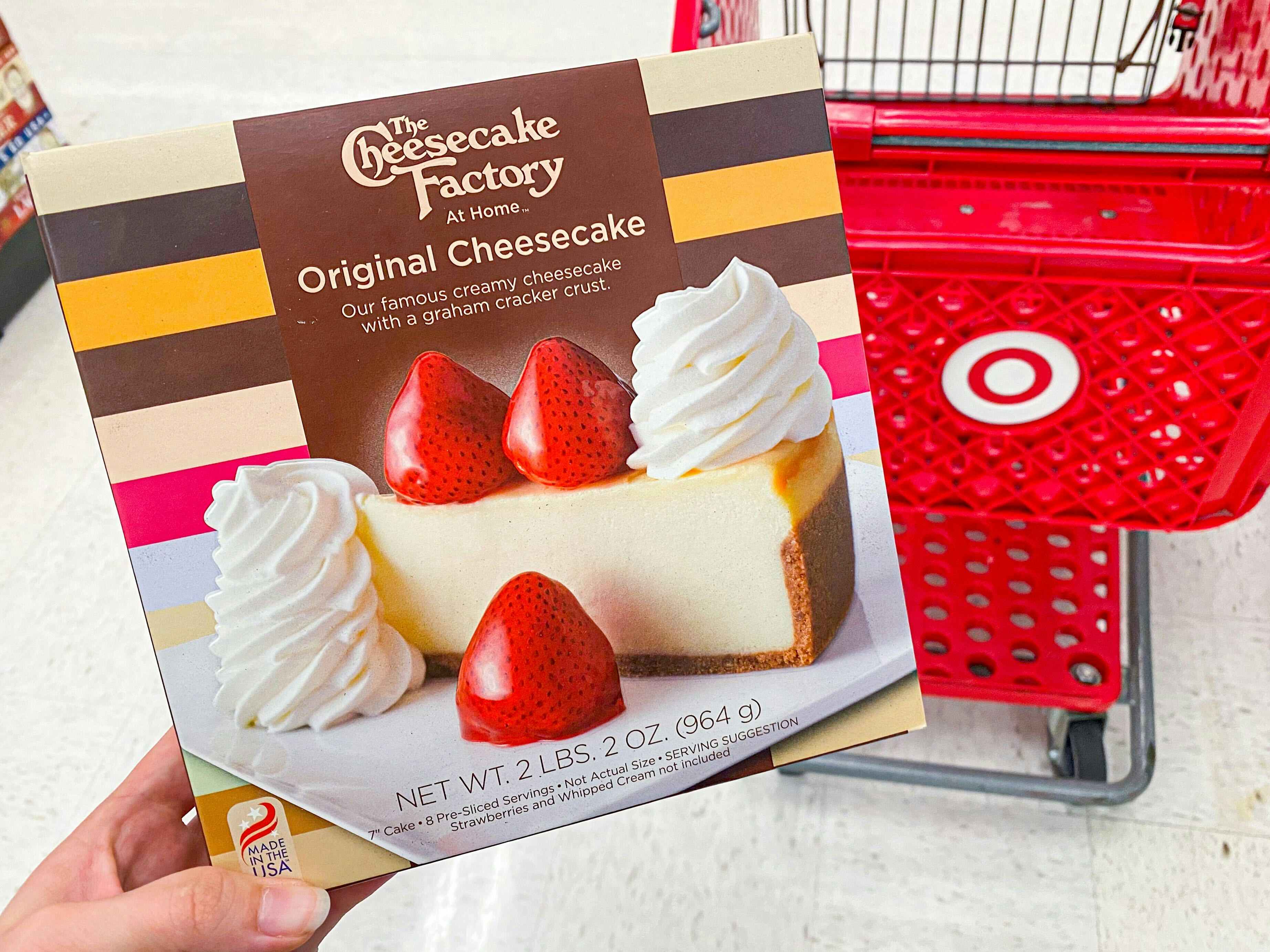 The Cheesecake Factory original cheesecake held next to a Target shopping cart