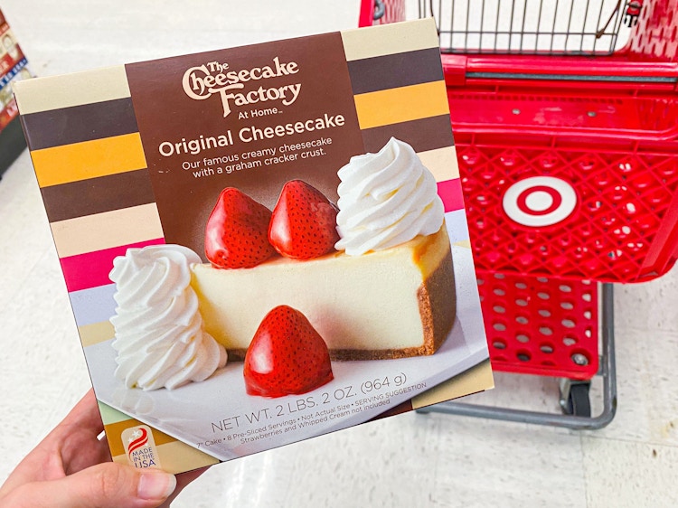 The Cheesecake Factory original cheesecake held next to a Target shopping cart
