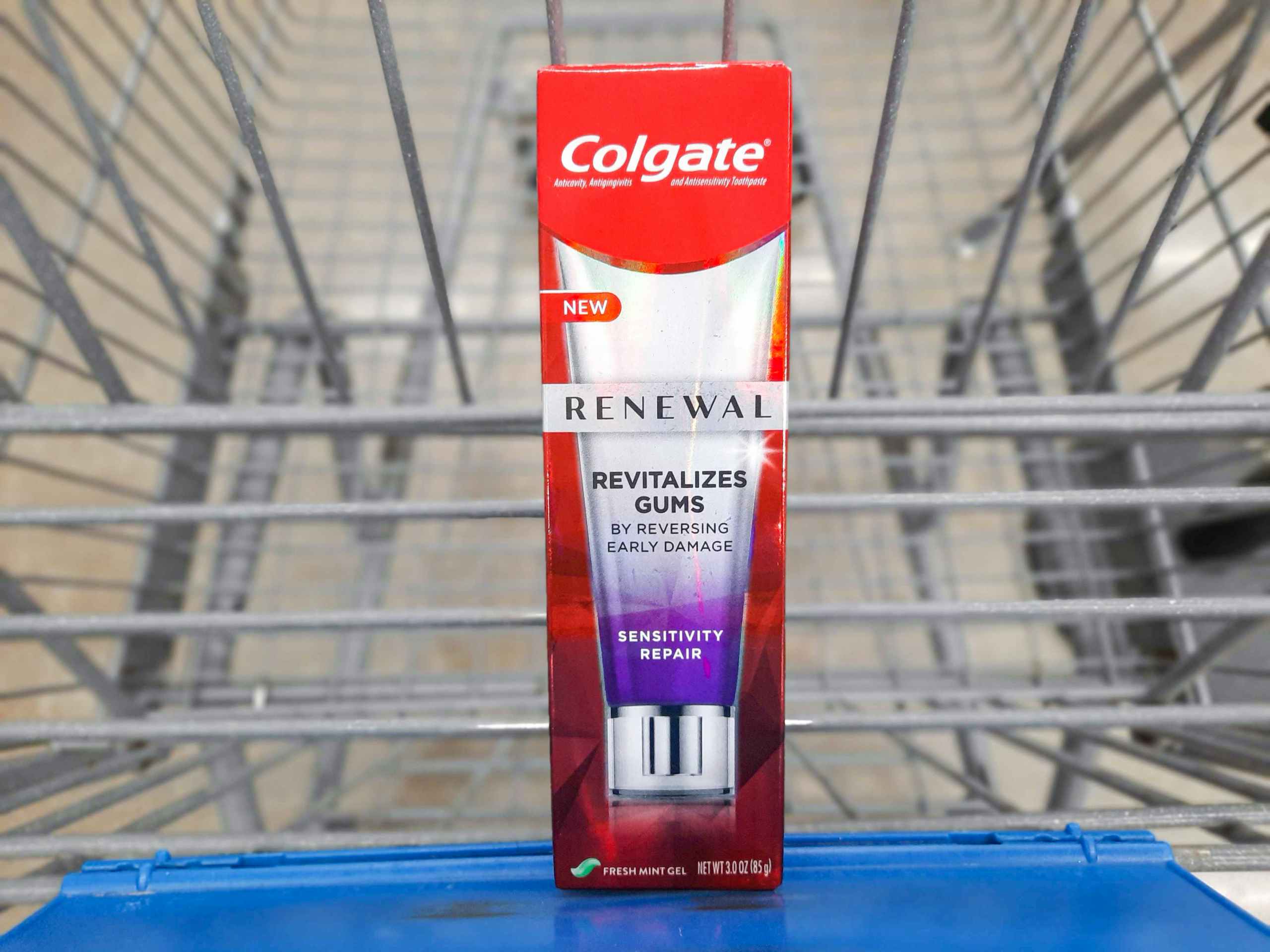 Colgate toothpaste box in Walmart shopping cart