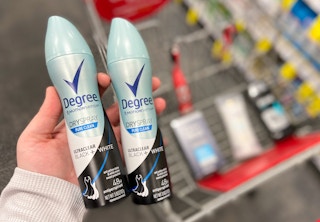 someone holding degree deodorant