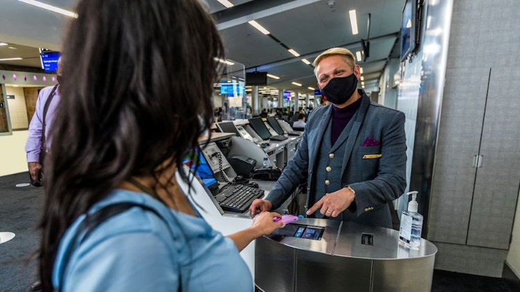 someone scanning plane ticket