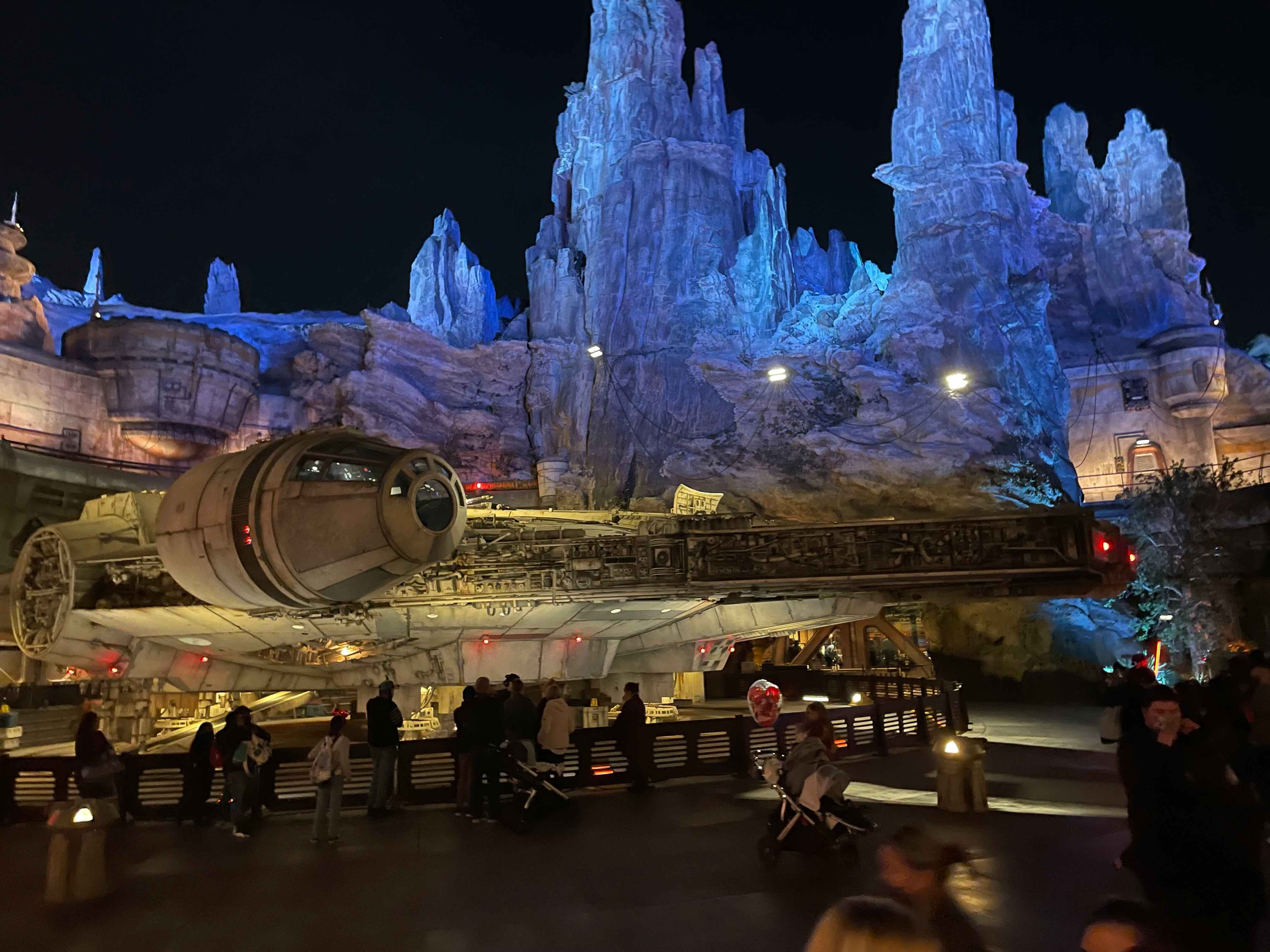 The Disneyland Star Wars Millennium Falcon ride at night.