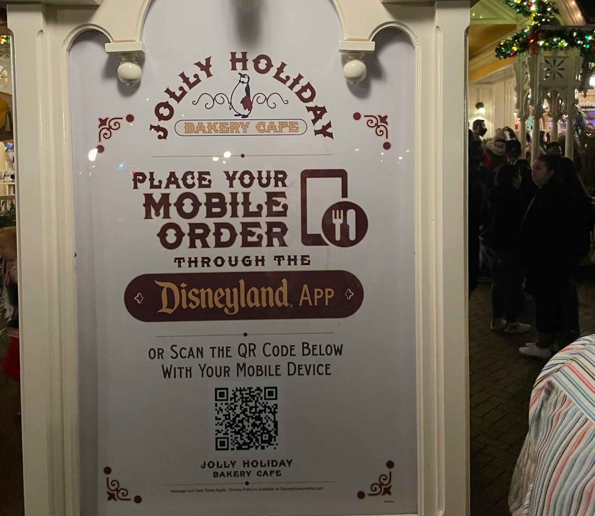 Disneyland restaurant sign with mobile ordering instructions