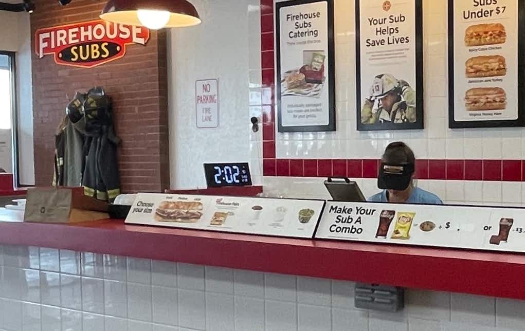 firehouse subs employee behind counter
