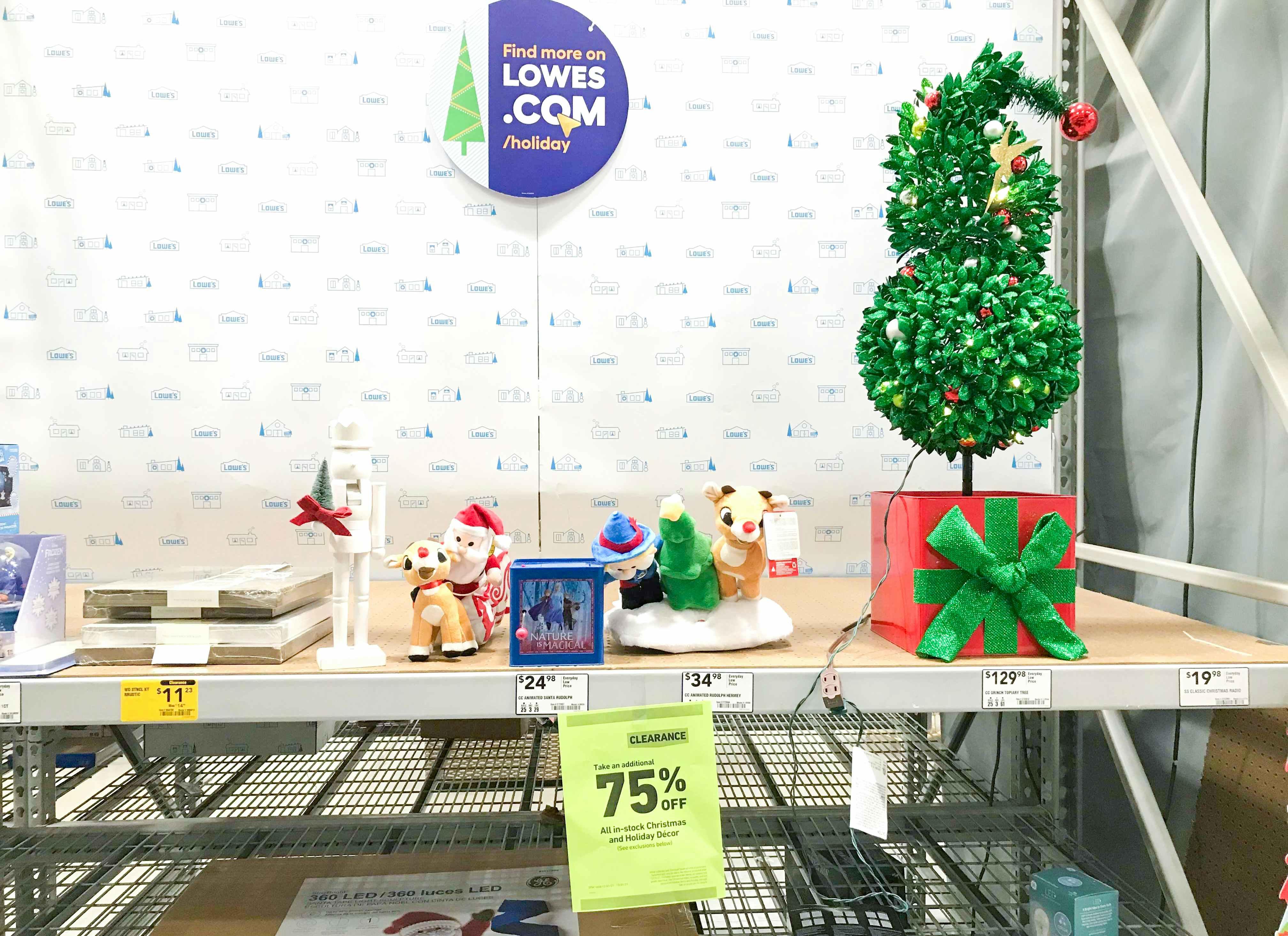 lowes christmas clearance grinch topiary on display