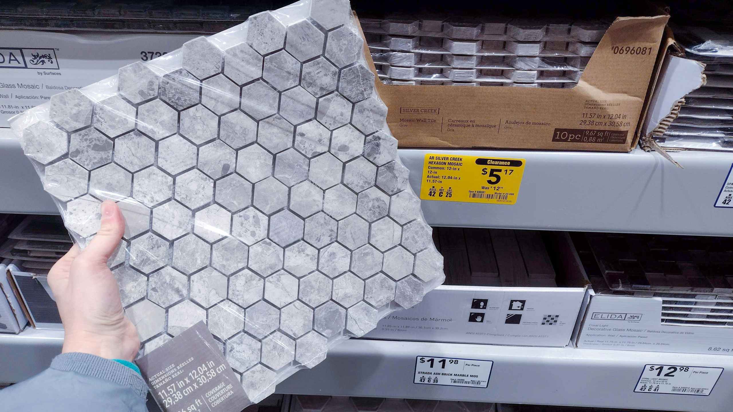 lowes year end clearance hexagon mosaic tiles hand holding