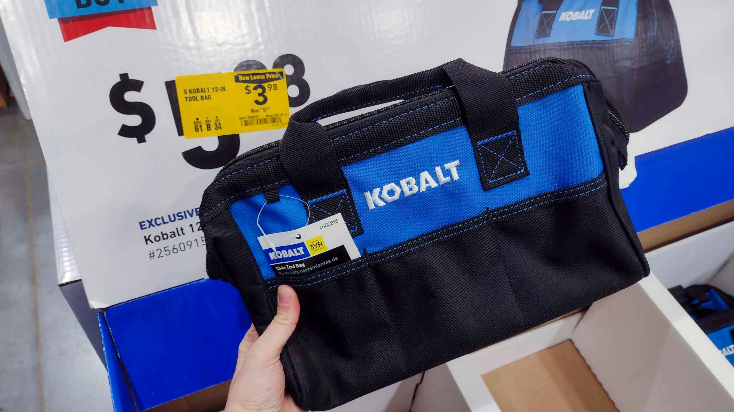 lowes year end clearance kobalt tool bag hand holding
