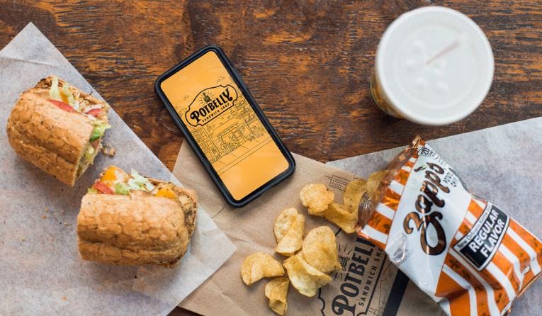phone with potbelly app and sandwich and chips