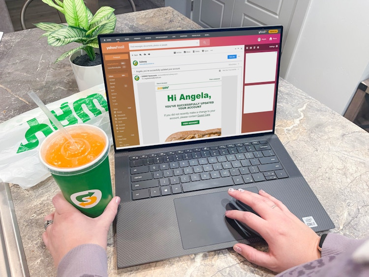 woman on laptop with subway looking subway email