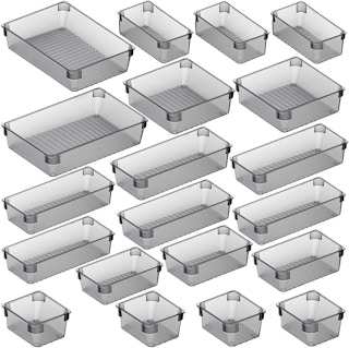 A set of 20 desk drawer organizers.