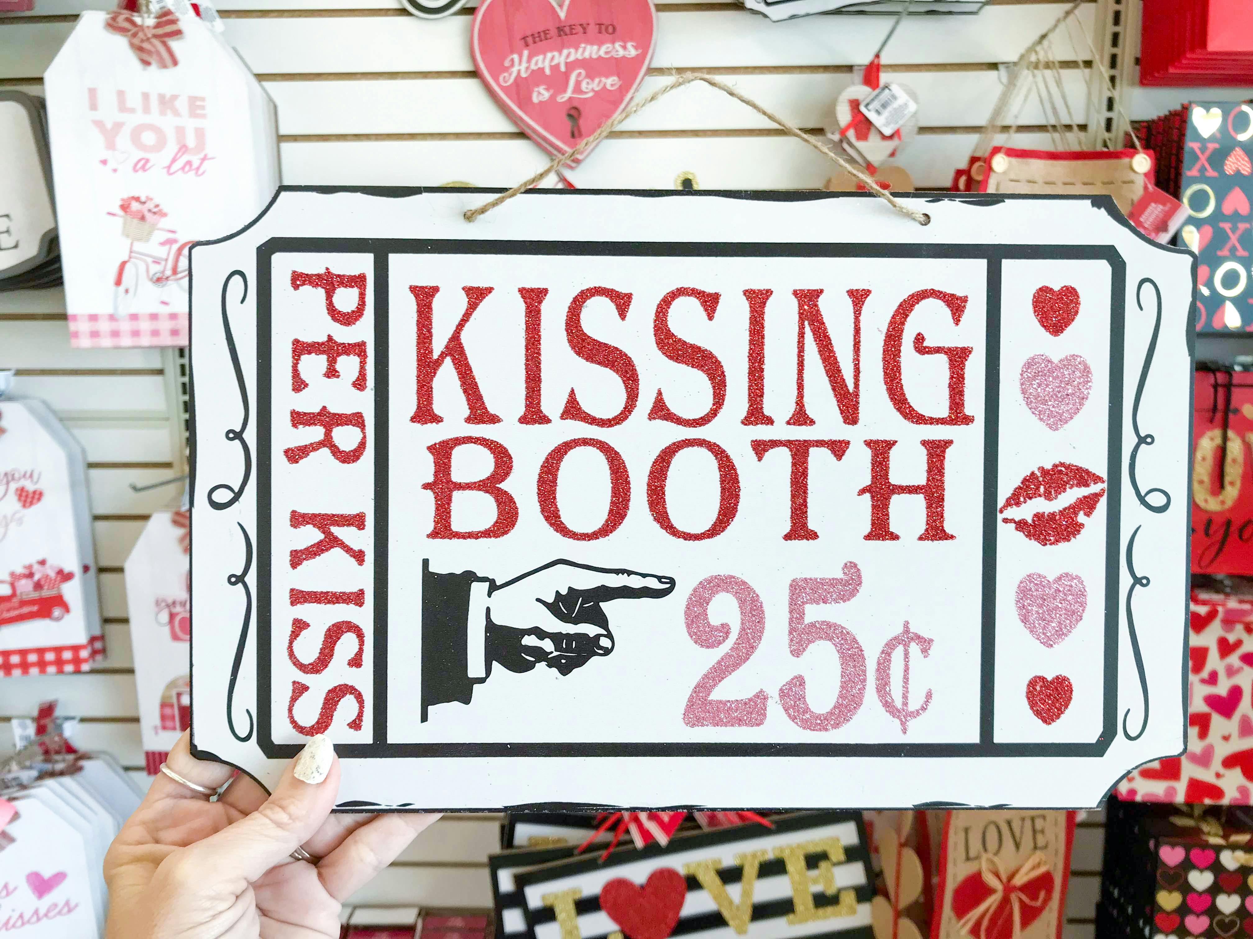 Kissing Booth sign at Dollar Tree
