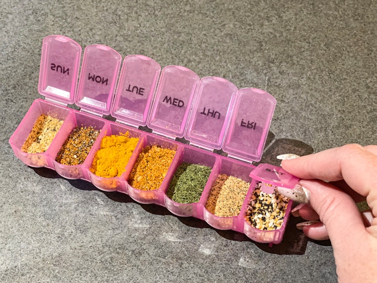 spices put into pill holder 