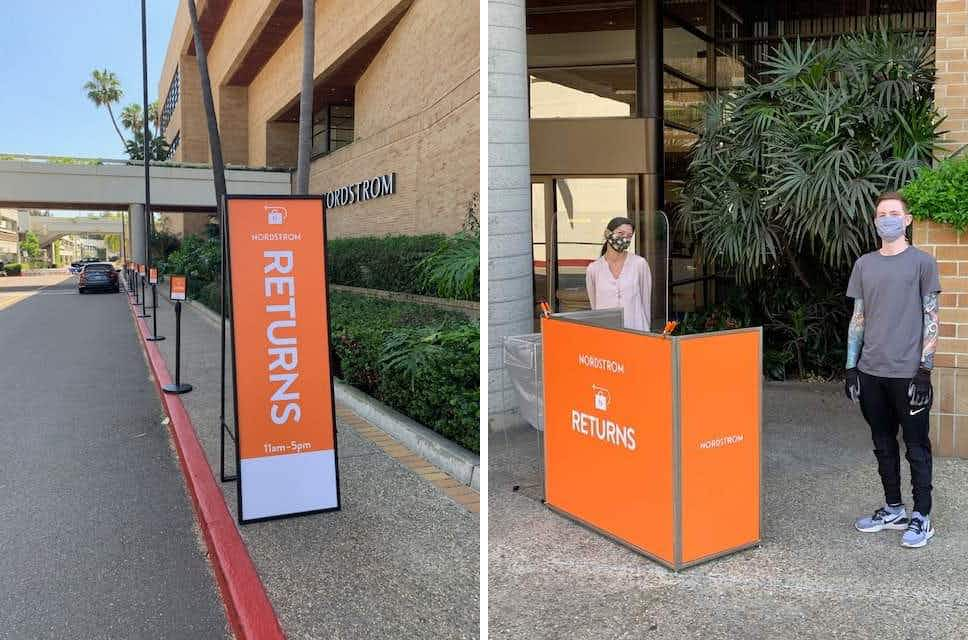 returns sign and counter in front of mall