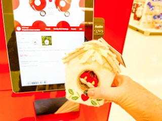 target plush birdhouse ornament hand holding