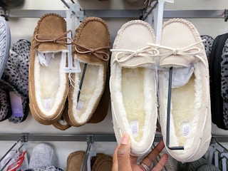 target stars above moccasins hand holding