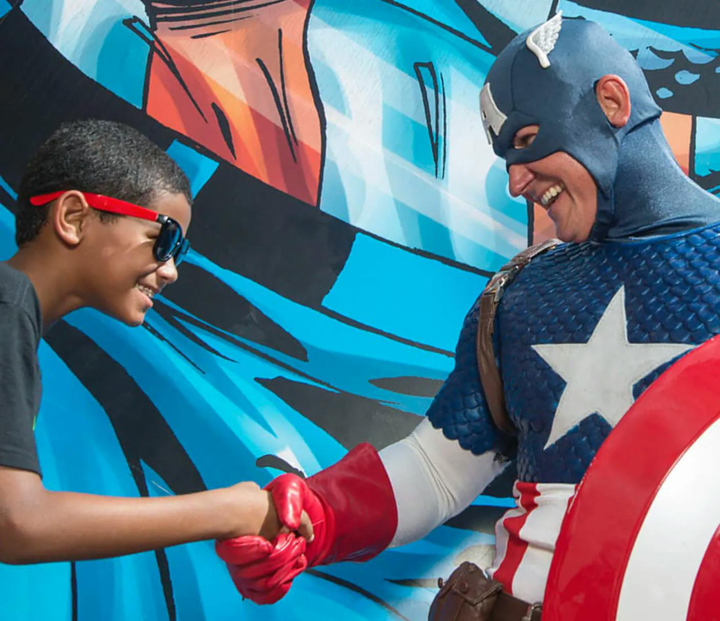 Universal Studios Captain America shaking hands with a kid