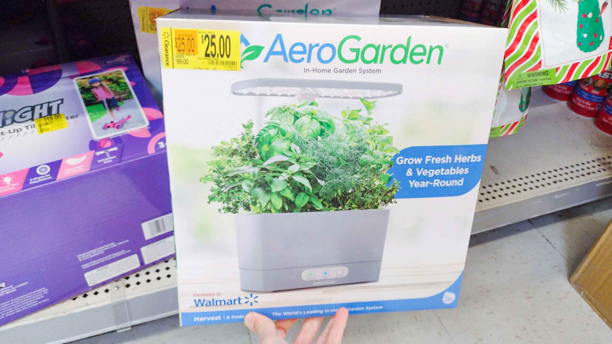 walmart aerogarden system hand holding