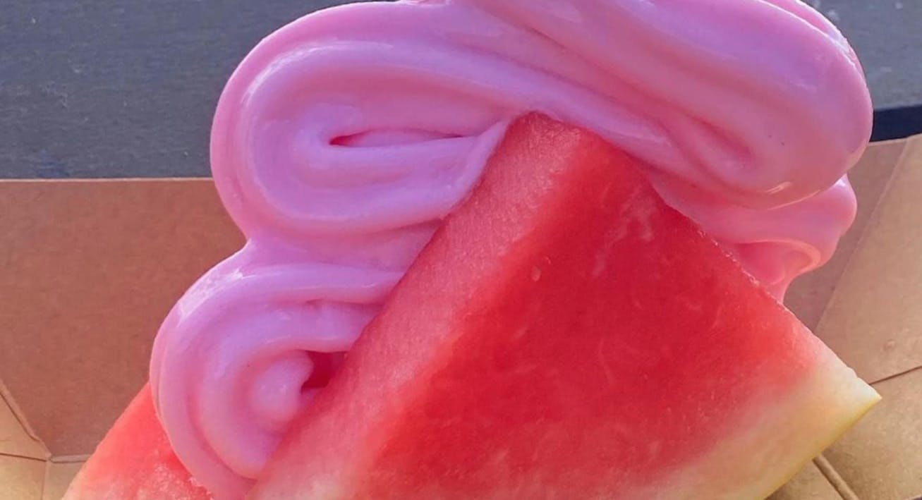 A close-up of a watermelon dole whip taco at Disney Springs.