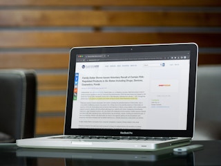 a laptop showing a recall press release from Family Dollar