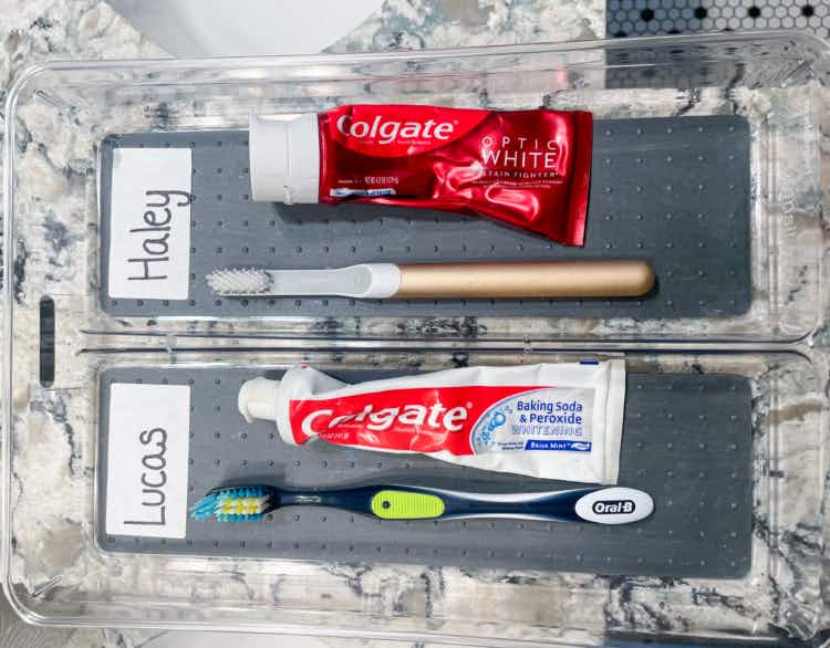 cutlery tray being used as a toothbrush organizer for kids