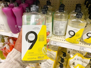hand holding 9 elements dish soap at target