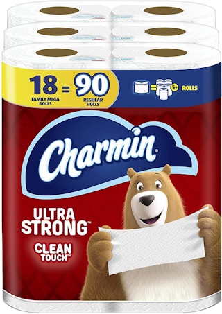 A pack of three Charmin toilet paper rolls.