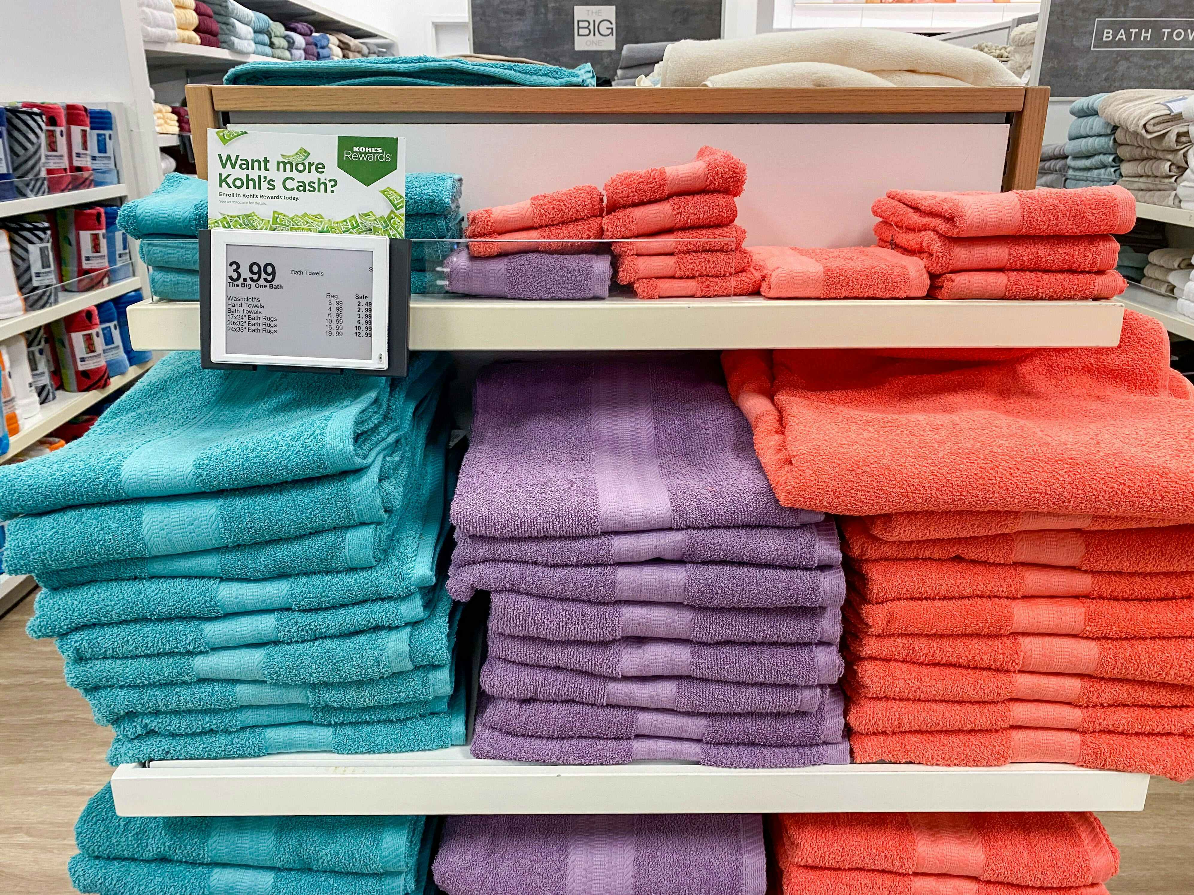 turquoise, purple, and coral the big one towels on display at kohls