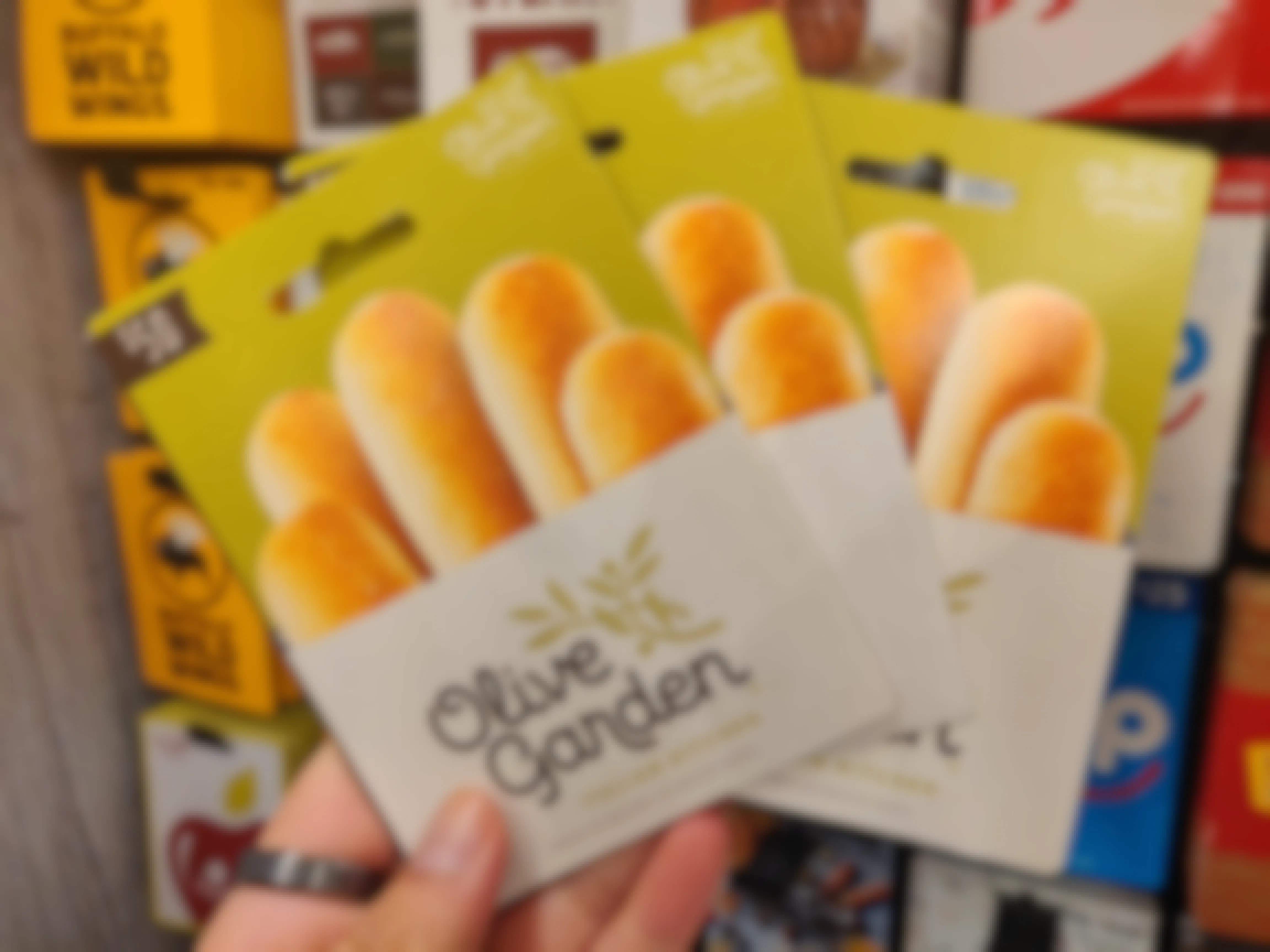 olive garden gift cards set on.a background of gift cards