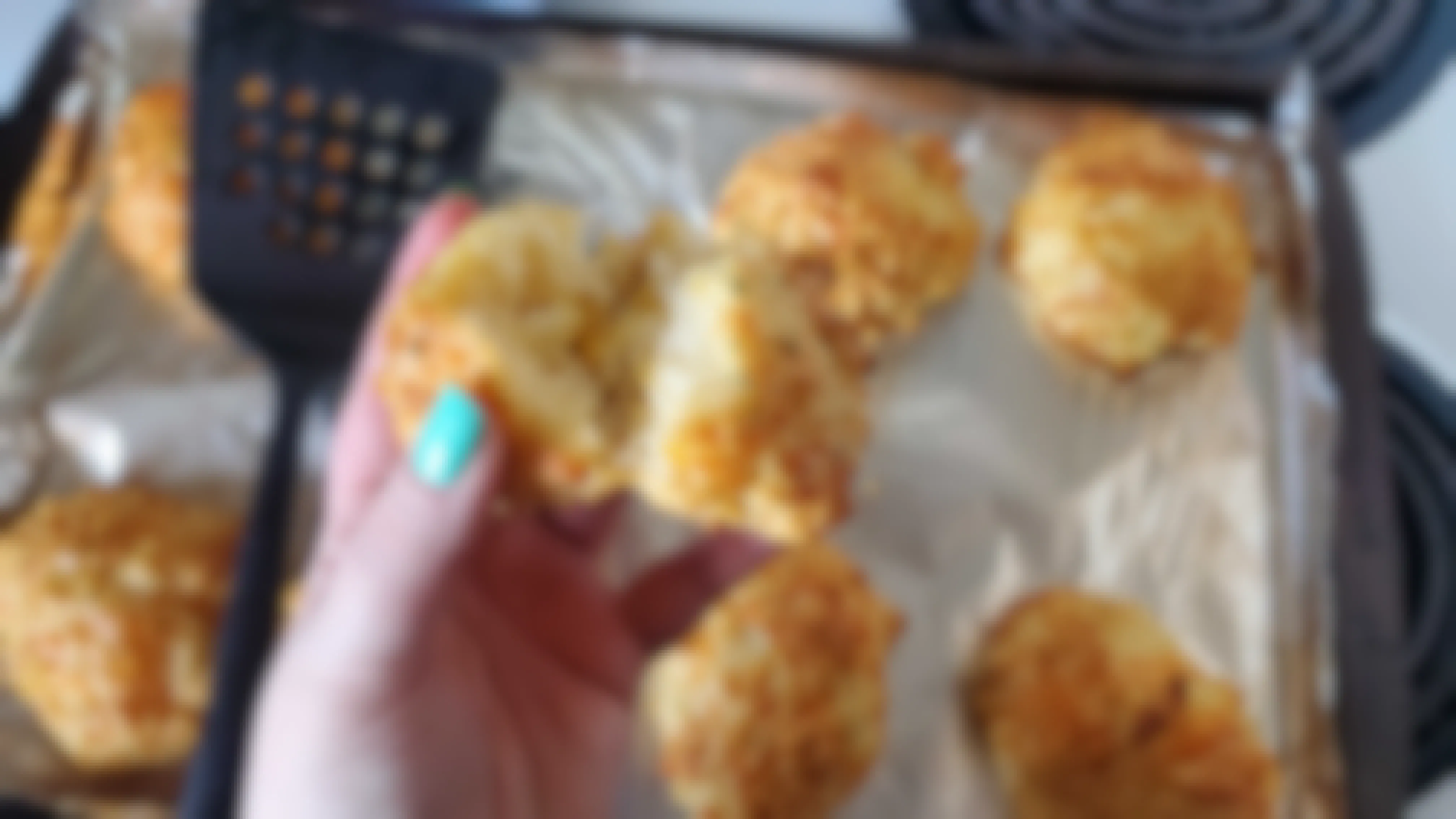woman holding homemade biscuits from red lobster