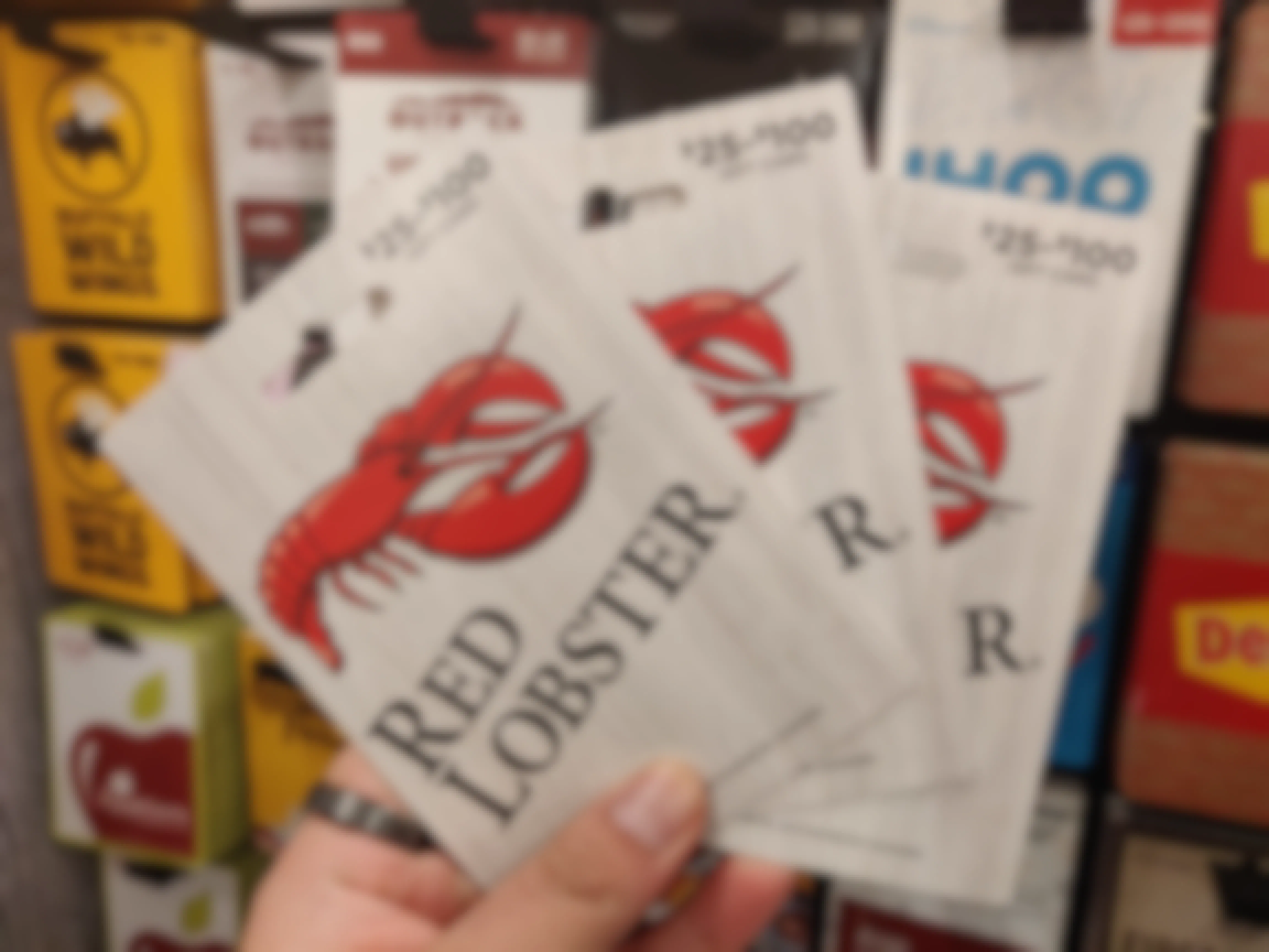 red lobster gift cards against a background of other gift cards