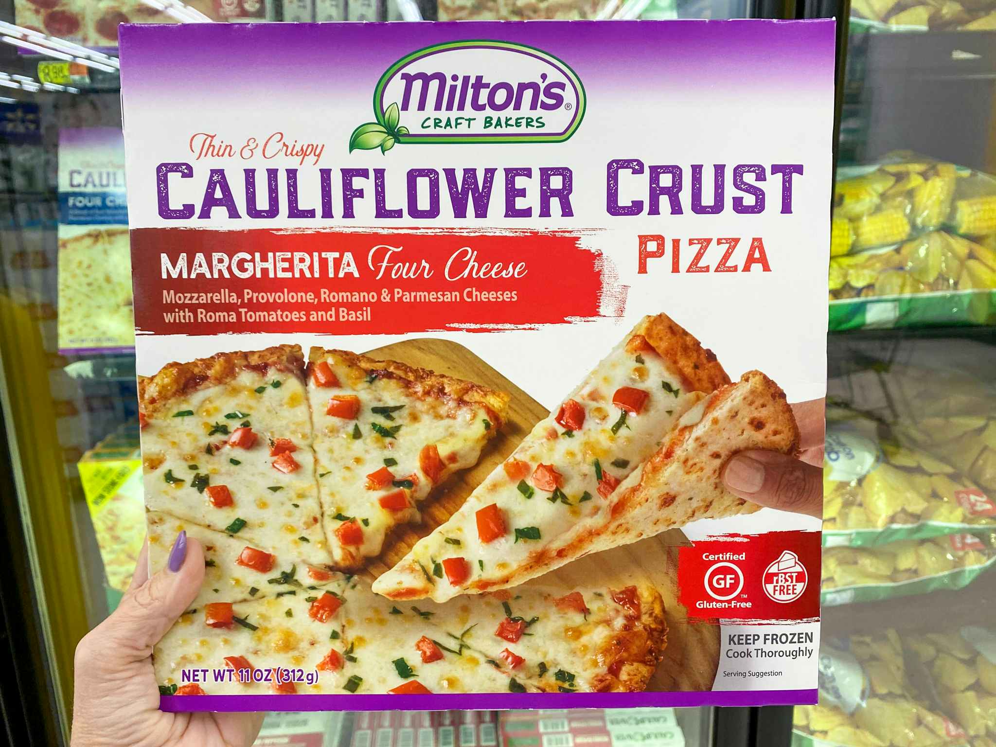 walmart milton cauliflower crust pizza hand holding