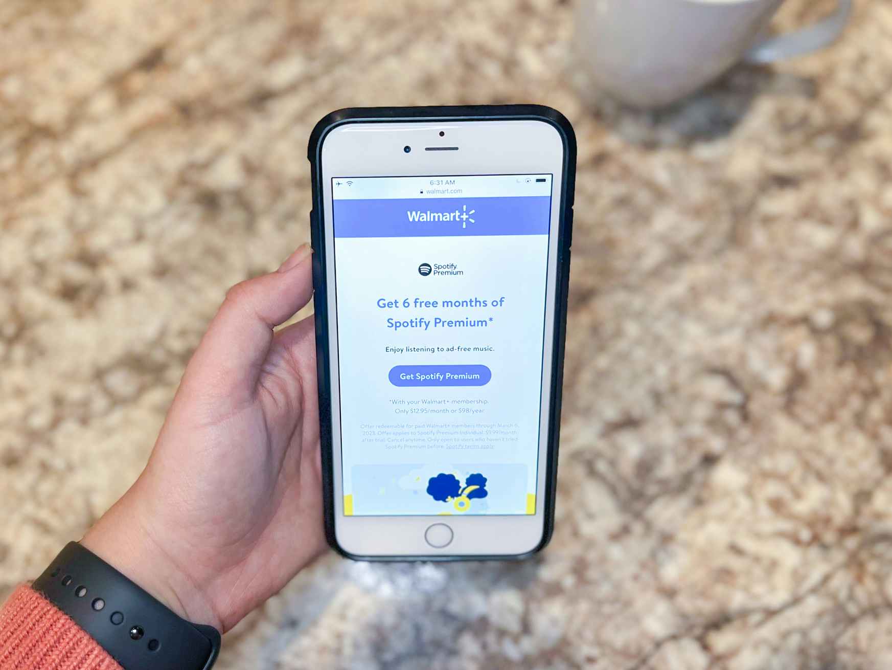 6 Months of Spotify Premium free for Walmart+ members offer page displayed on iPhone screen