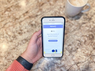 6 Months of Spotify Premium free for Walmart+ members offer page displayed on iPhone screen