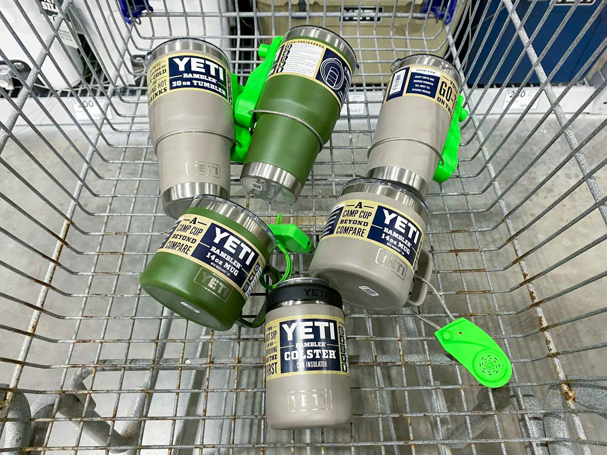Different kinds of YETI cups and mugs in a shopping cart.
