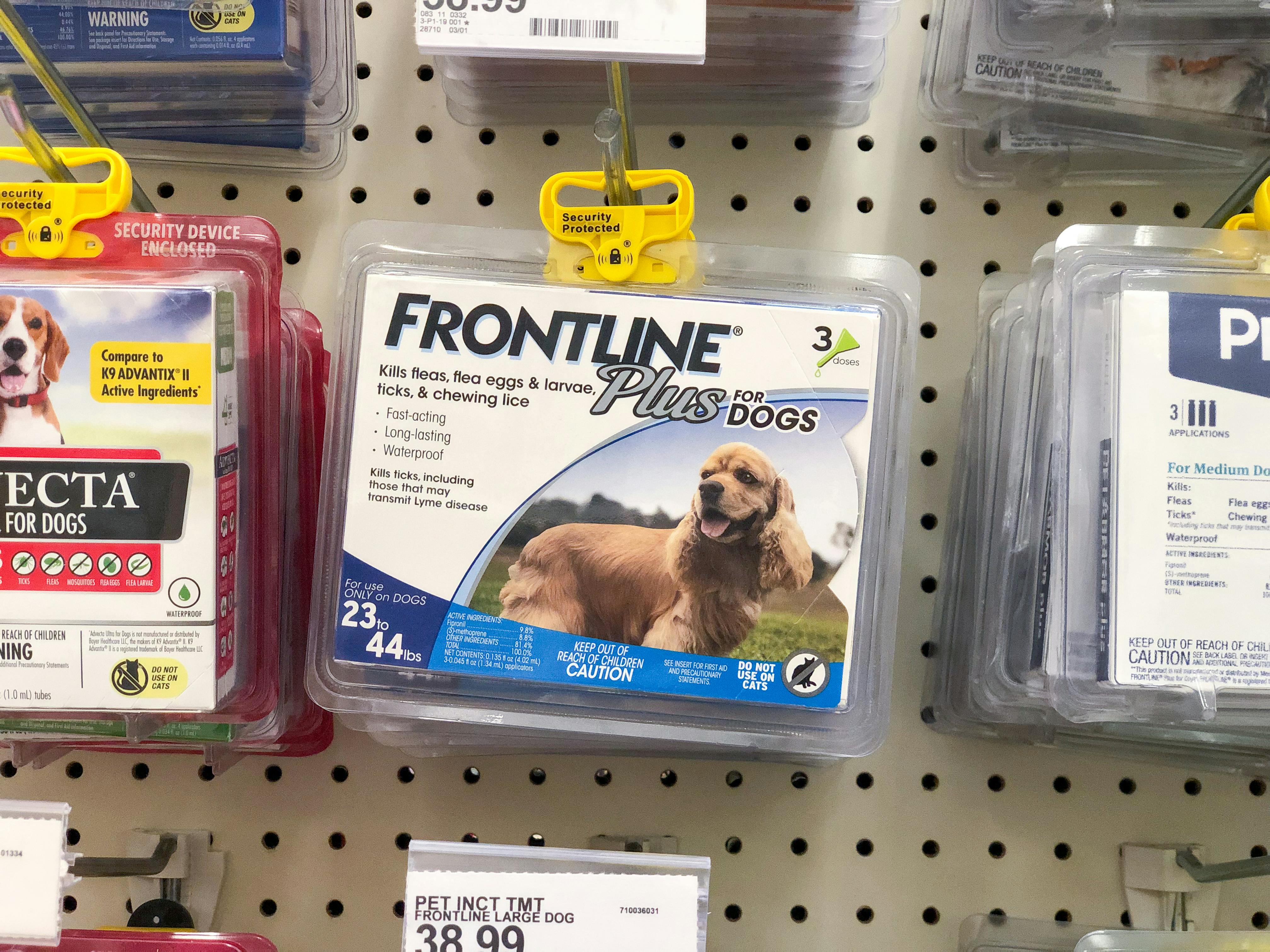 Frontline Plus medicine hanging on a store hook.