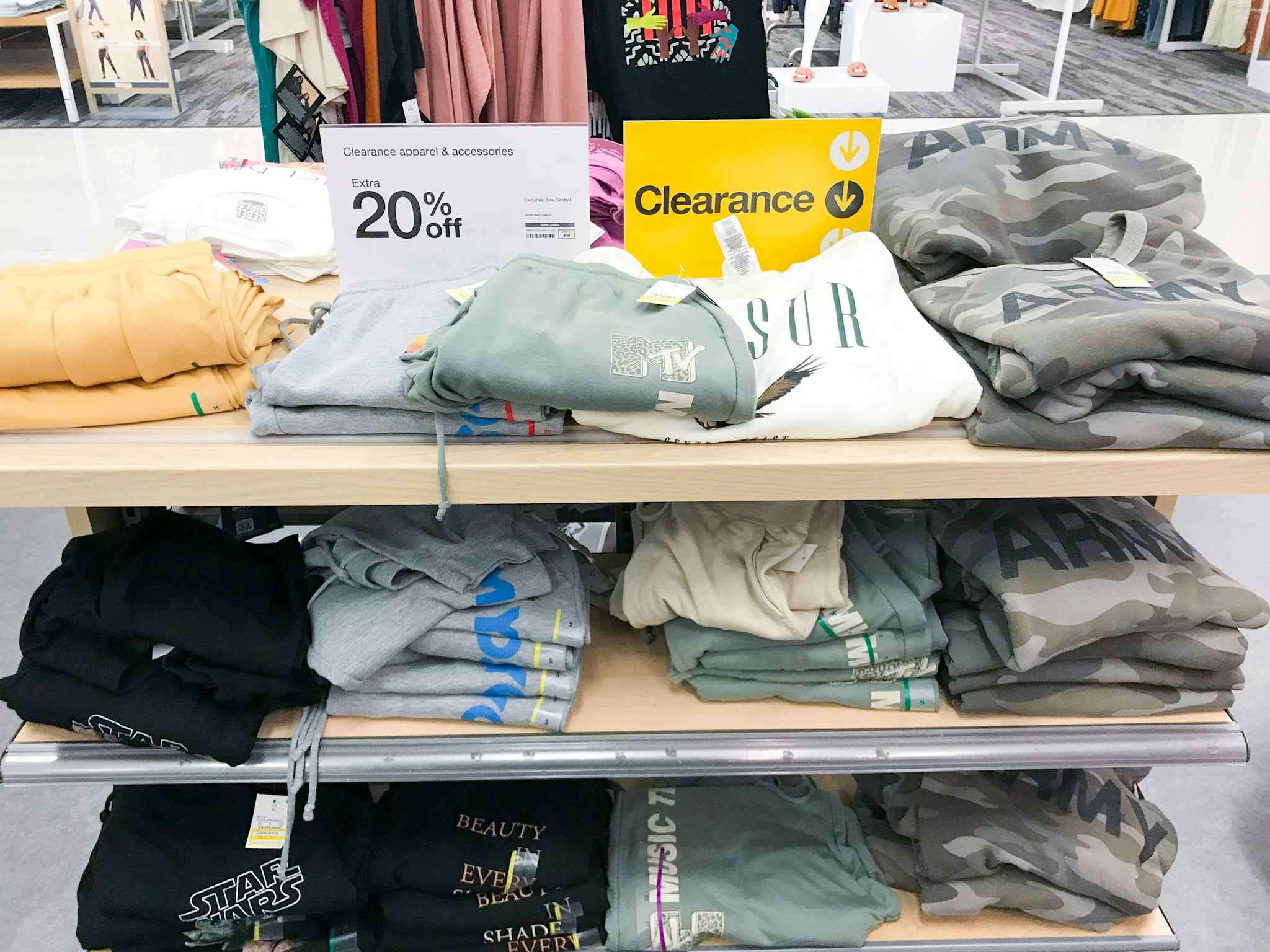 loungewear on a clearance display table at Target for 20% off