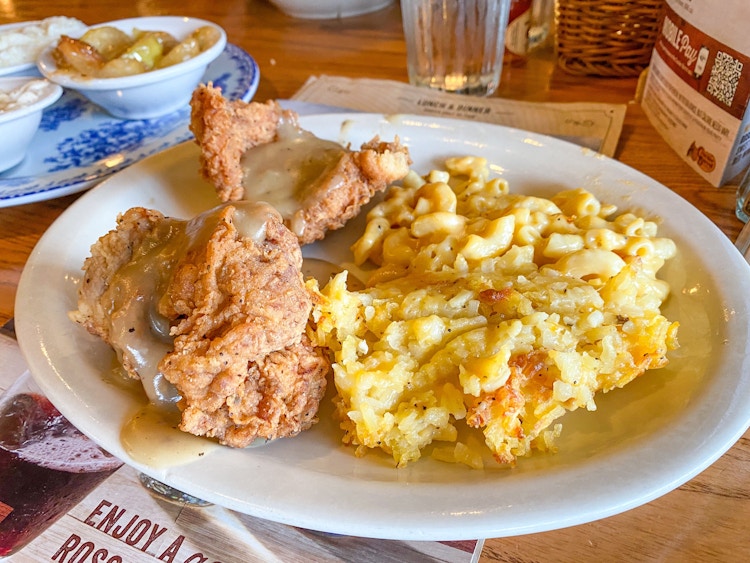 A plated meal from Cracker Barrel's specials menu on a table at Cracker Barrel.