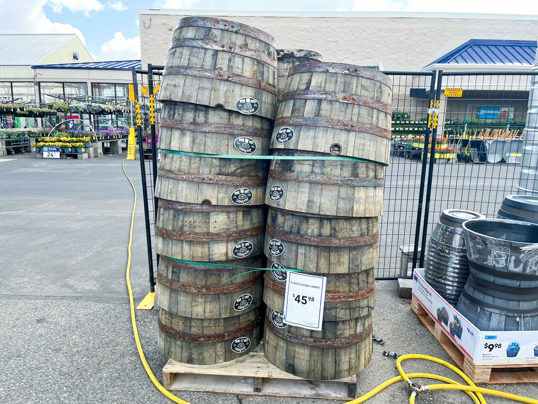 lowes jack daniels whiskey barrel planter on display