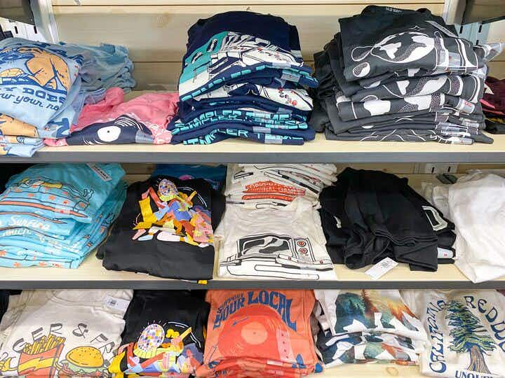 graphic tees on shelf