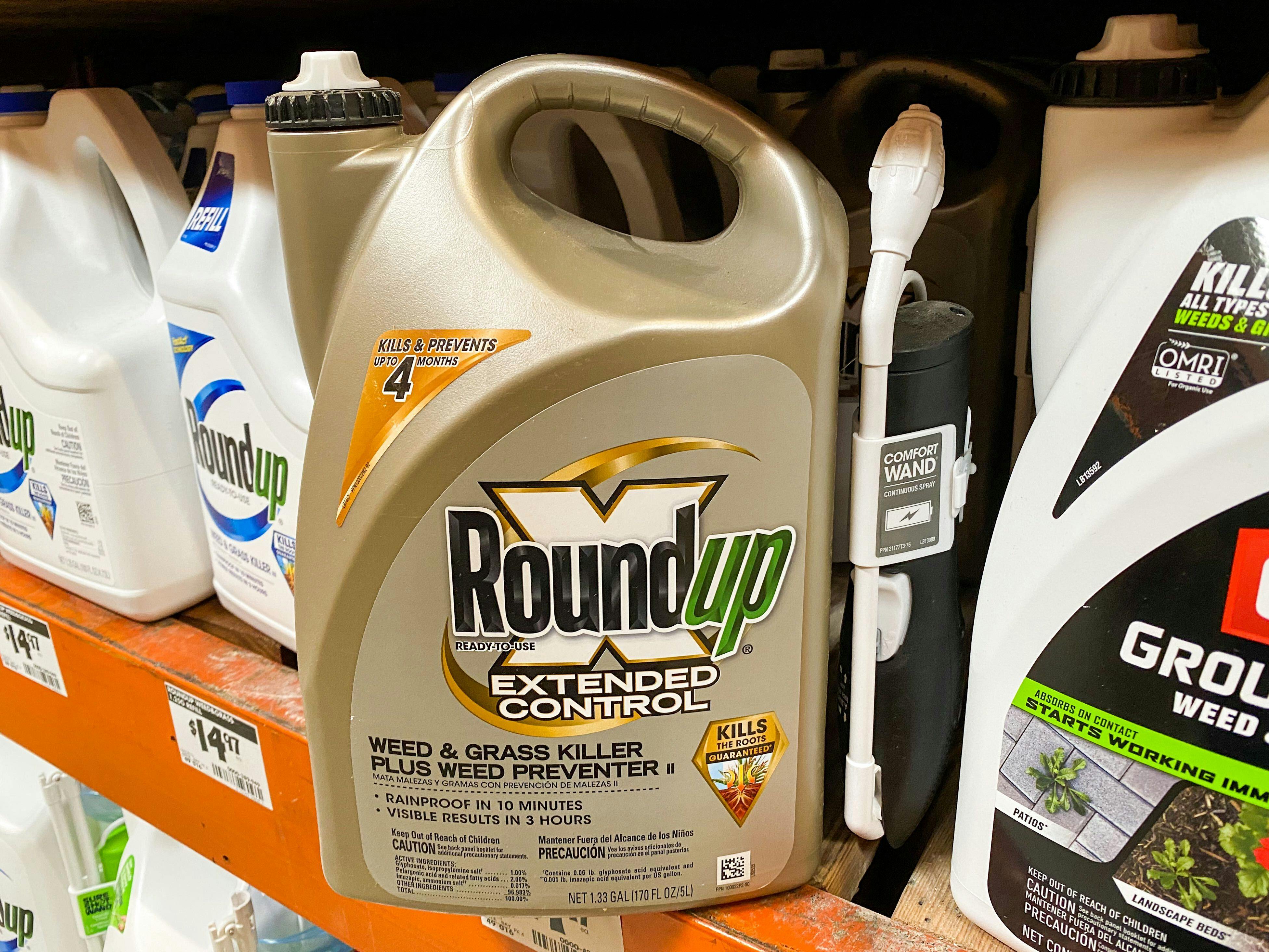 A bottle of RoundUp weed killer refill on the shelf at home depot