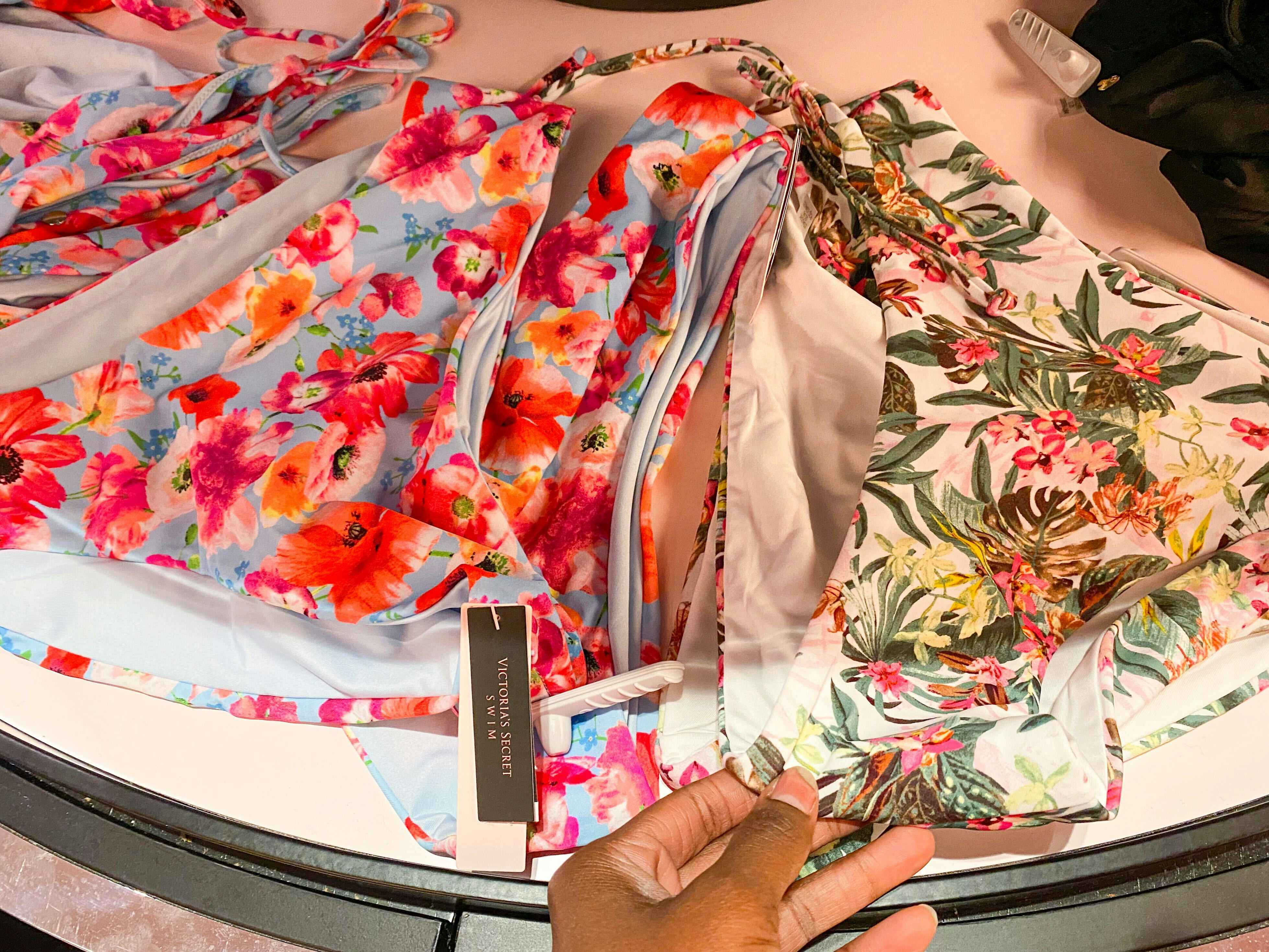 Floral swim bottoms on a display table at Victoria's Secret