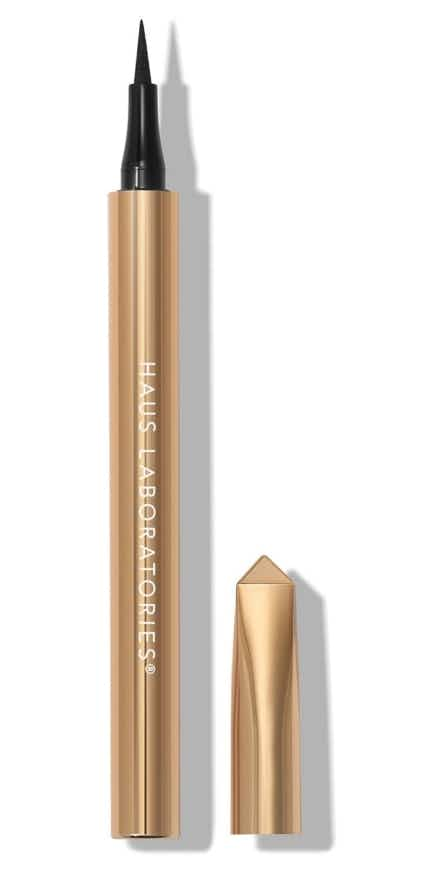 A Haus Laboratories liquid eyeliner in gold.