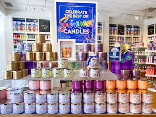 The Celebrate the Best of Summer 3-wick candle display at Bath & Body Works.
