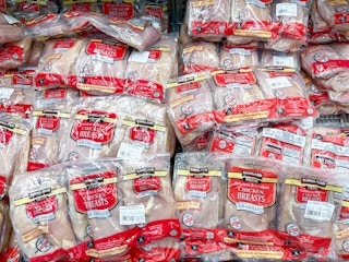 bags of frozen kirkland signature fresh boneless and skinless chicken breast ay costco