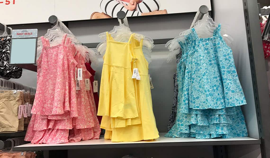 girls dresses in store on hangers