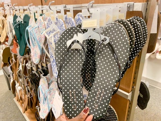 womens flip flops on hangers in store