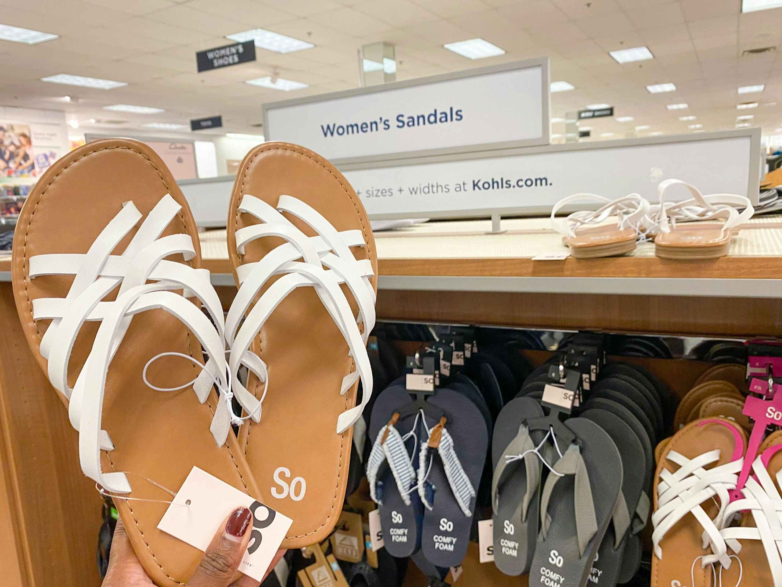 so sandals on hangers in store