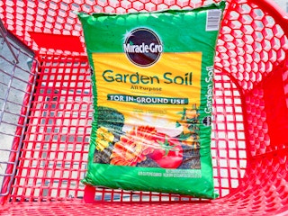 Miracle Gro Garden Soil in Lowe's shopping cart