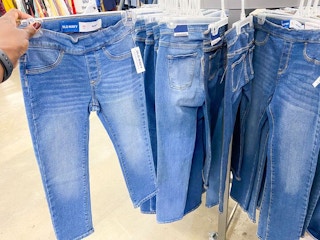 kids jeans on hangers