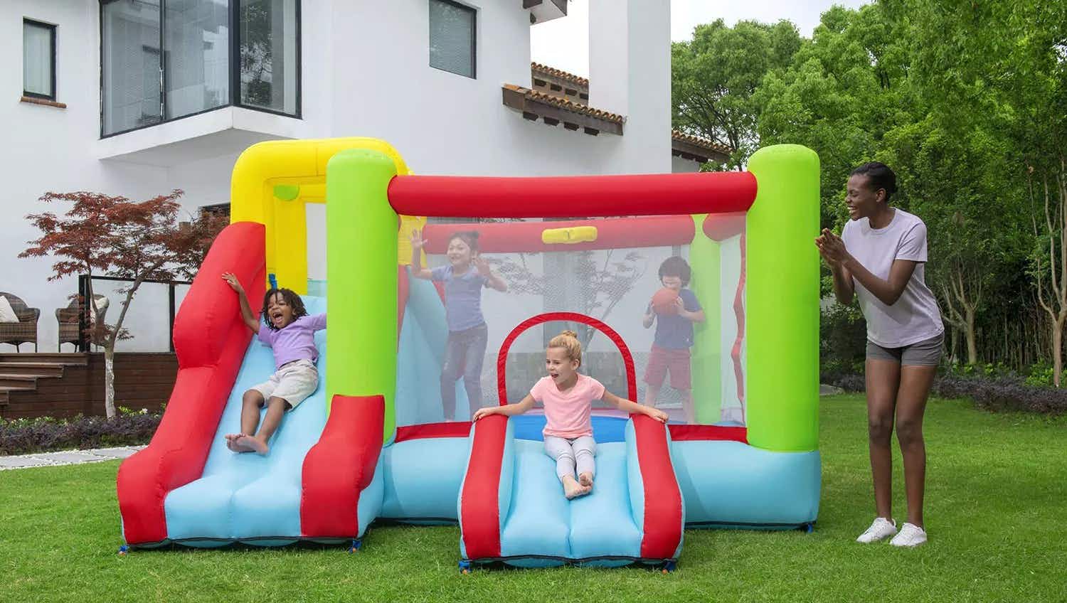 bounce house set up with kids playing in it